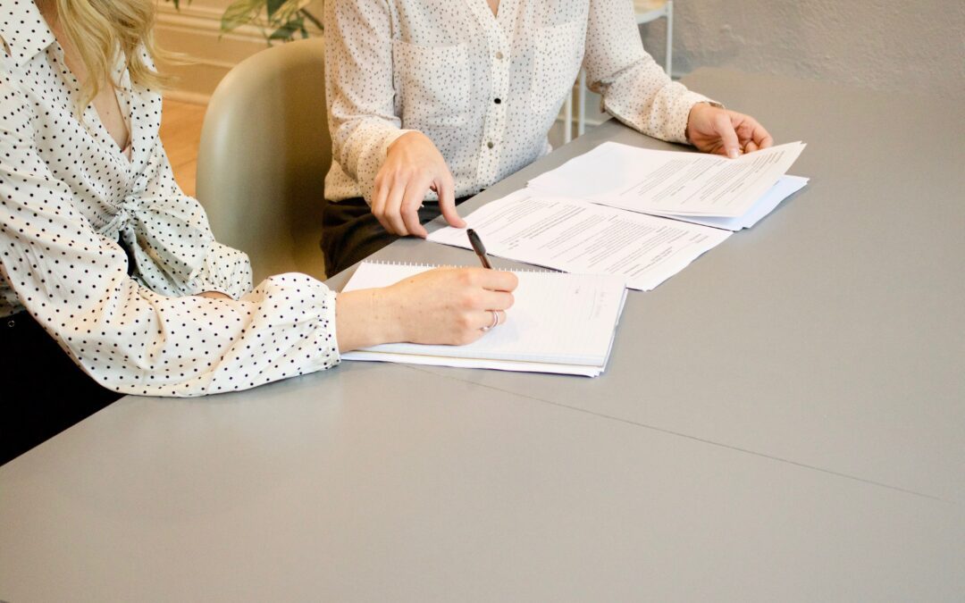 Two people researching cash balance plans