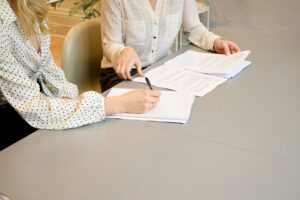 Two people researching cash management strategies